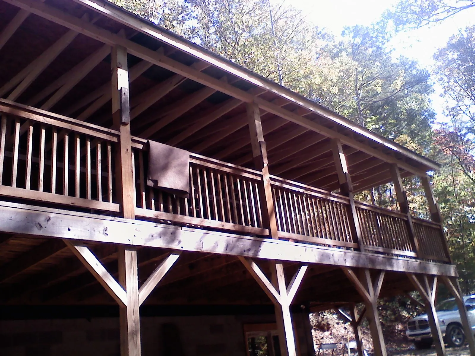 Timber framing under a new elevated porch and deck — Roof Leak Repair in Shannock by Roofing Brothers